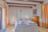 Posteľ alebo postele v izbe v ubytovaní Apartment Vilma Funtana
