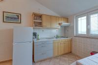 Kuchyňa alebo kuchynka v ubytovaní Apartment Vilma Funtana