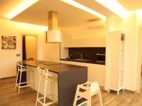 A kitchen or kitchenette at T Villa