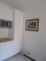 Kuchyňa alebo kuchynka v ubytovaní Appartamenti Residence il Porto 13 e 16