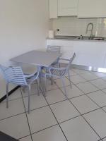 Kuchyňa alebo kuchynka v ubytovaní Appartamenti Residence il Porto 13 e 16