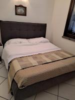Posteľ alebo postele v izbe v ubytovaní Appartamenti Residence il Porto 13 e 16