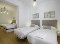 Posteľ alebo postele v izbe v ubytovaní SibsBcn-Paseo de Gracia Luxury Exclusive Gaudí