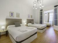 Posteľ alebo postele v izbe v ubytovaní SibsBcn-Paseo de Gracia Luxury Exclusive Gaudí