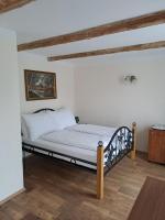 Łóżko lub łóżka w pokoju w obiekcie Lesní Hotel Peršlák
