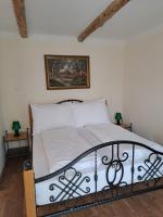 Łóżko lub łóżka w pokoju w obiekcie Lesní Hotel Peršlák