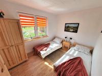 Posteľ alebo postele v izbe v ubytovaní Holiday Home Zagroda nad Krutynią by Interhome