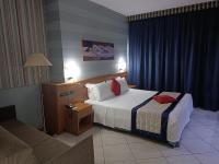 Posteľ alebo postele v izbe v ubytovaní Green Hotel Ninfa