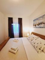 Posteľ alebo postele v izbe v ubytovaní Apartman Marin - Zadar
