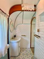 a bathroom with a sink and a toilet and a shower at Azienda agricola Della Mezzaluna in Stiava