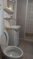 Kúpeľňa v ubytovaní Apartments Popov
