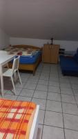 Posteľ alebo postele v izbe v ubytovaní Apartments Popov