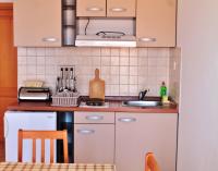 Kuchyňa alebo kuchynka v ubytovaní Apartments Gubo