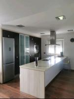 Kuchyň nebo kuchyňský kout v ubytování Casa con finca en Oviedo El Casero