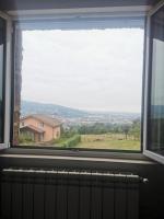 Nespecifikovaný výhled na hory nebo výhled na hory při pohledu z prázdninového domu