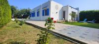 Vonkajšia záhrada v ubytovaní Pool Seaside Relais - VILLE Ninfea, Marea, Rosa e Cassiopea