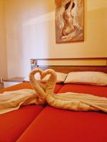 Postel nebo postele na pokoji v ubytování Guest House Sombrero