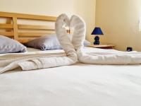 Postel nebo postele na pokoji v ubytování Guest House Sombrero
