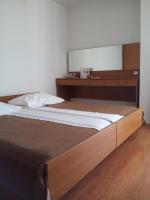 Postel nebo postele na pokoji v ubytování Guest House Vukušić