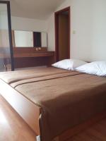 Postel nebo postele na pokoji v ubytování Guest House Vukušić