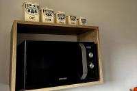 En TV eller et underholdningssystem p&aring; Appartement dans chalet - 75 m2 - 4 &agrave; 6 personnes
