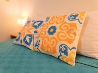 A bed or beds in a room at Waterside Inn