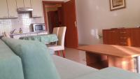 Kuchyň nebo kuchyňský kout v ubytování Apartment & Room Angerona