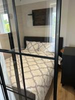 Posteľ alebo postele v izbe v ubytovaní Nieborowska Loft - stylish apartment