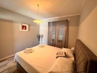 Posteľ alebo postele v izbe v ubytovaní Sea and Lemon Tree apartment