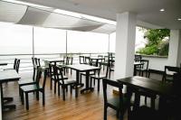 En restaurant eller et andet spisested på KaiBlue Hotel y Restaurante