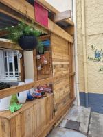 a wooden fence outside of a building at Le lorrain in Campagne-sur-Aude