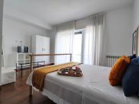 Łóżko lub łóżka w pokoju w obiekcie Canneddi Boutique Farm