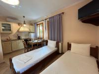 Posteľ alebo postele v izbe v ubytovaní Διαμέρισμα 4 ατόμων-Cozy Family apartment close to the most beautiful beaches