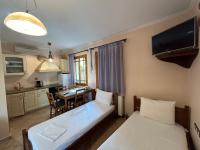 Posteľ alebo postele v izbe v ubytovaní Διαμέρισμα 4 ατόμων-Cozy Family apartment close to the most beautiful beaches