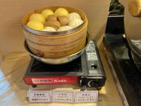 a bowl of food sitting on top of a scale at Link World Hotel in Taipei