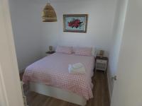 Posteľ alebo postele v izbe v ubytovaní Villa Olivia con Piscina, Jardin y Parking