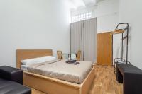 Posteľ alebo postele v izbe v ubytovaní CAMP NOU & FiRA BUSINESS LOFTS