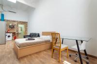 Posteľ alebo postele v izbe v ubytovaní CAMP NOU & FiRA BUSINESS LOFTS