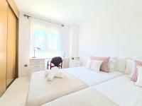 Posteľ alebo postele v izbe v ubytovaní Apartamento 3 dormitorios Malaga (Teatinos)