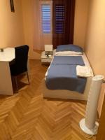 Posteľ alebo postele v izbe v ubytovaní Toni&Megi Apartment