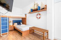 Postel nebo postele na pokoji v ubytování MEDANO4YOU Tejita Beach Cottage