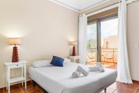 Postel nebo postele na pokoji v ubytování MEDANO4YOU Tejita Beach Cottage
