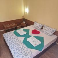 A bed or beds in a room at Complex Dobrudja