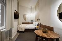TG Hotel Apartments Budapestにあるベッド