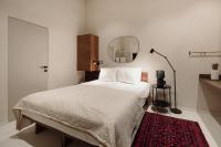 TG Hotel Apartments Budapestにあるベッド