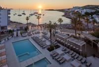an aerial view of a resort with a pool and the ocean at Hotel & Spa Blau Parc in San Antonio
