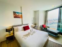 Postel nebo postele na pokoji v ubytování Edge Central Pattaya Vip Condo