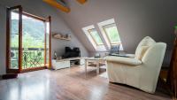 Televízia a/alebo spoločenská miestnosť v ubytovaní Holiday house Kajfes