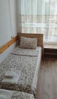 Postel nebo postele na pokoji v ubytování Family Hotel Kentavar 2