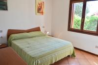 Posteľ alebo postele v izbe v ubytovaní ISS Travel, Ambra apartments - 800 m from La Cinta beach